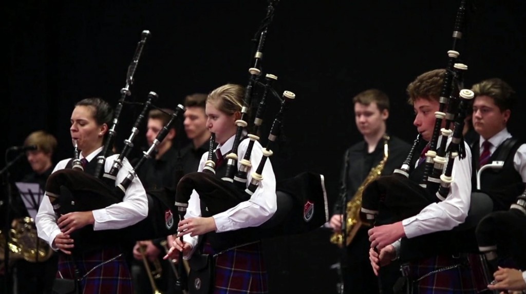 Children playing alongside other instrumentalists at the school's Championships this year 