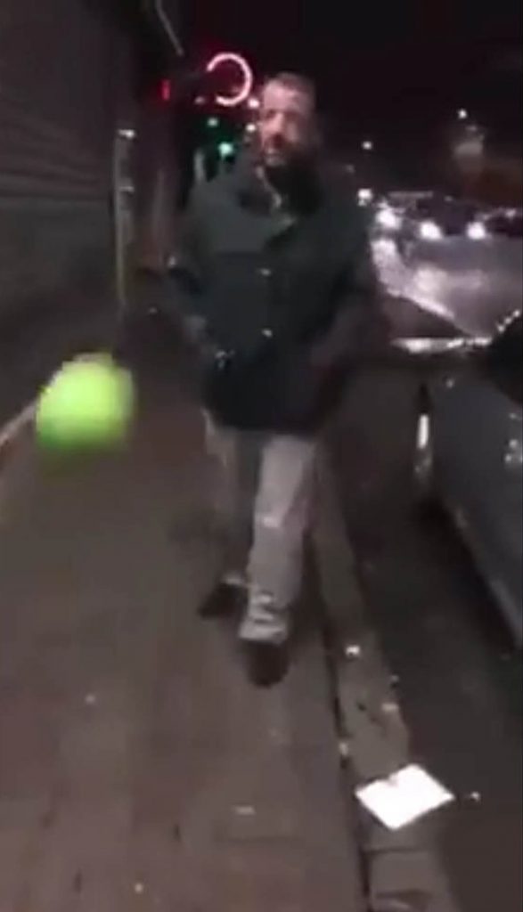 A FOOTBALL fan with the hardest skull in Scotland has been filmed crashing  into a metal shop shutter after a game of keepie-uppie goes wrong. 