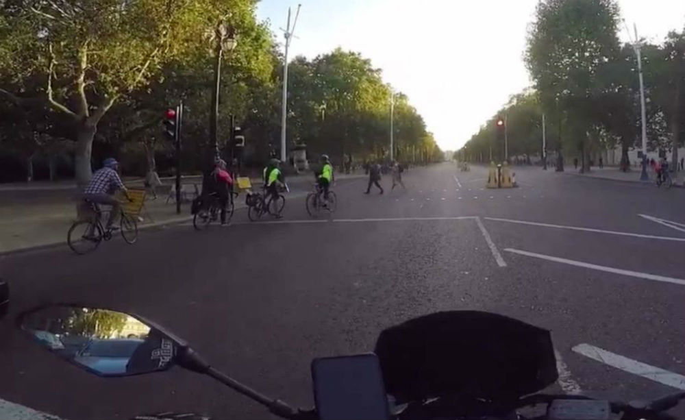 Road users enraged by footage showing 12 cyclists go through red light