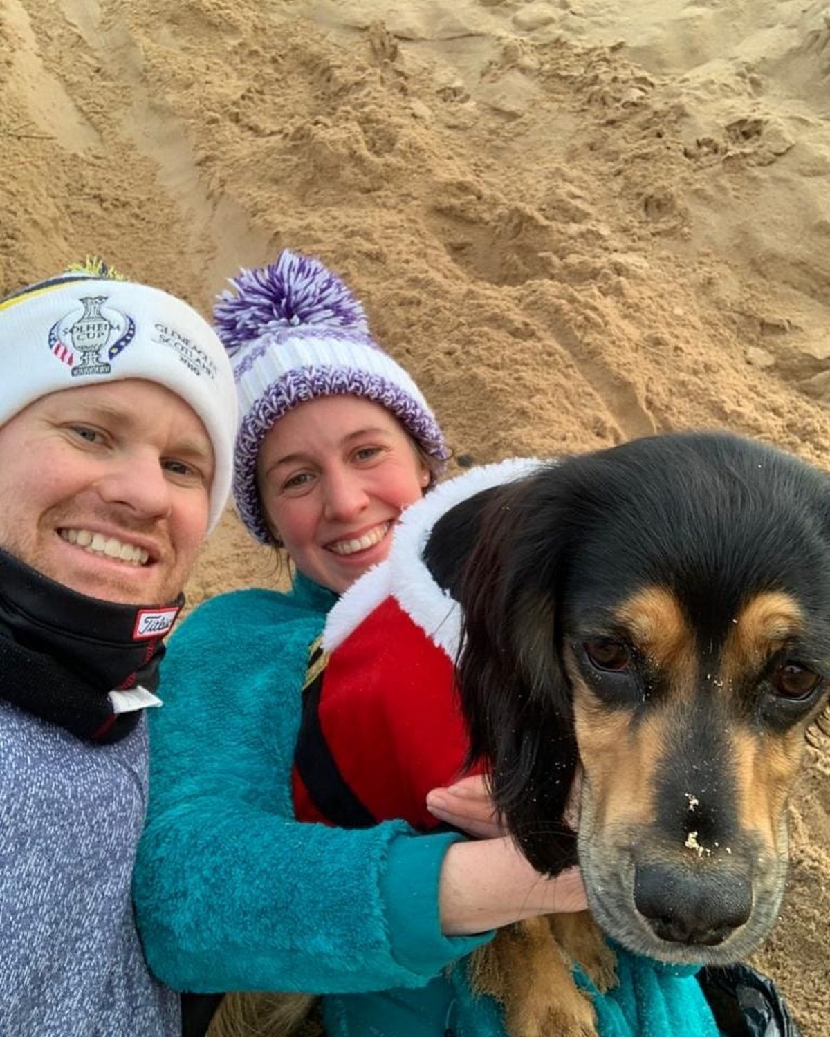 Hannah with her partner Euan and their dog Poppy.