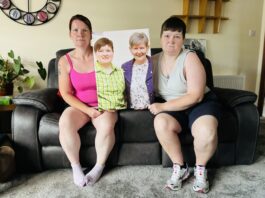 Laura and Morag with photograph of Evalyn