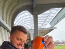 Jordan Presley and Andrew Stewart enjoying Iron Bru at footie game