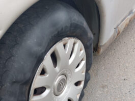 The tire was bulging in a number of places and had worn tread.