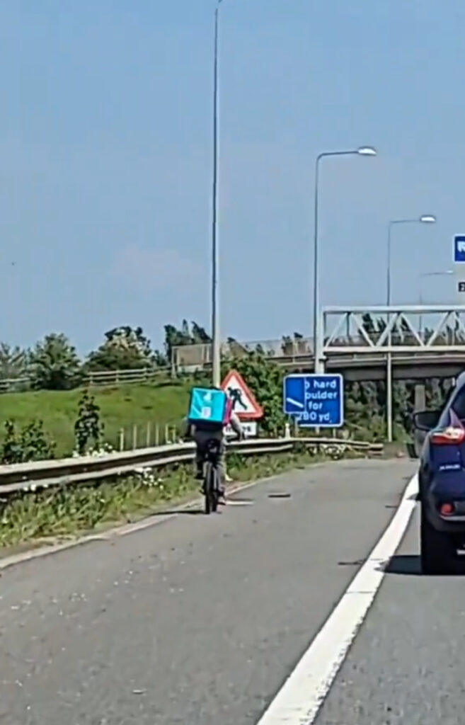 An electric sign was put up to warn motorists of the cyclist.