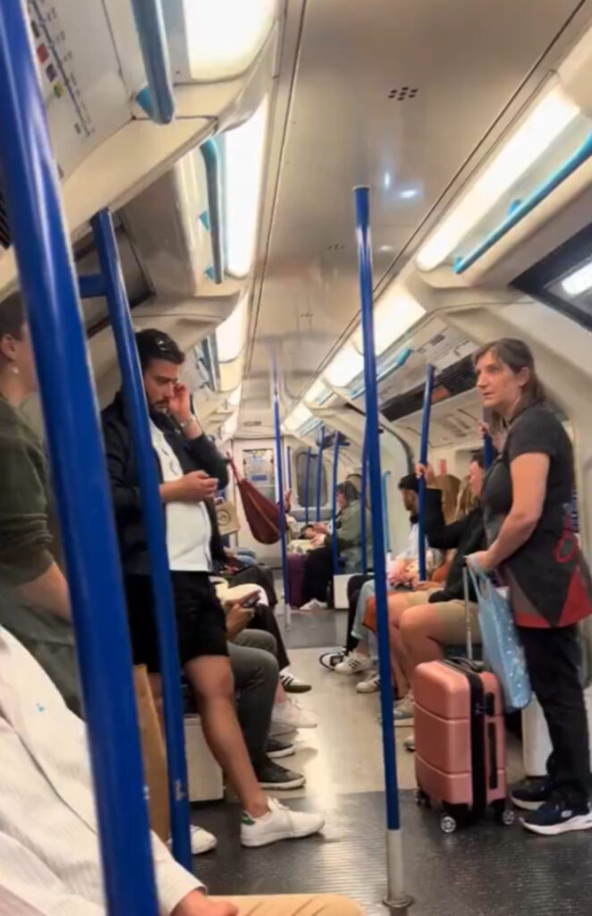 The man relaxed in his comfy hammock while the train took him to his destination.