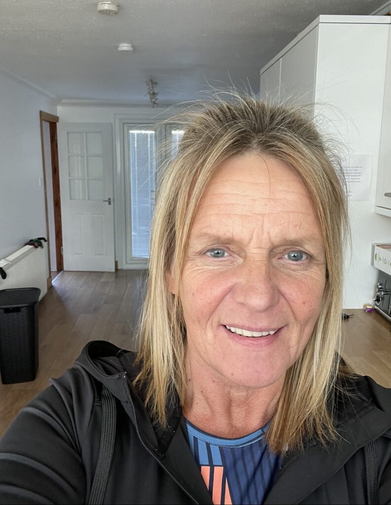 Carole Duffy smiling in a selfie