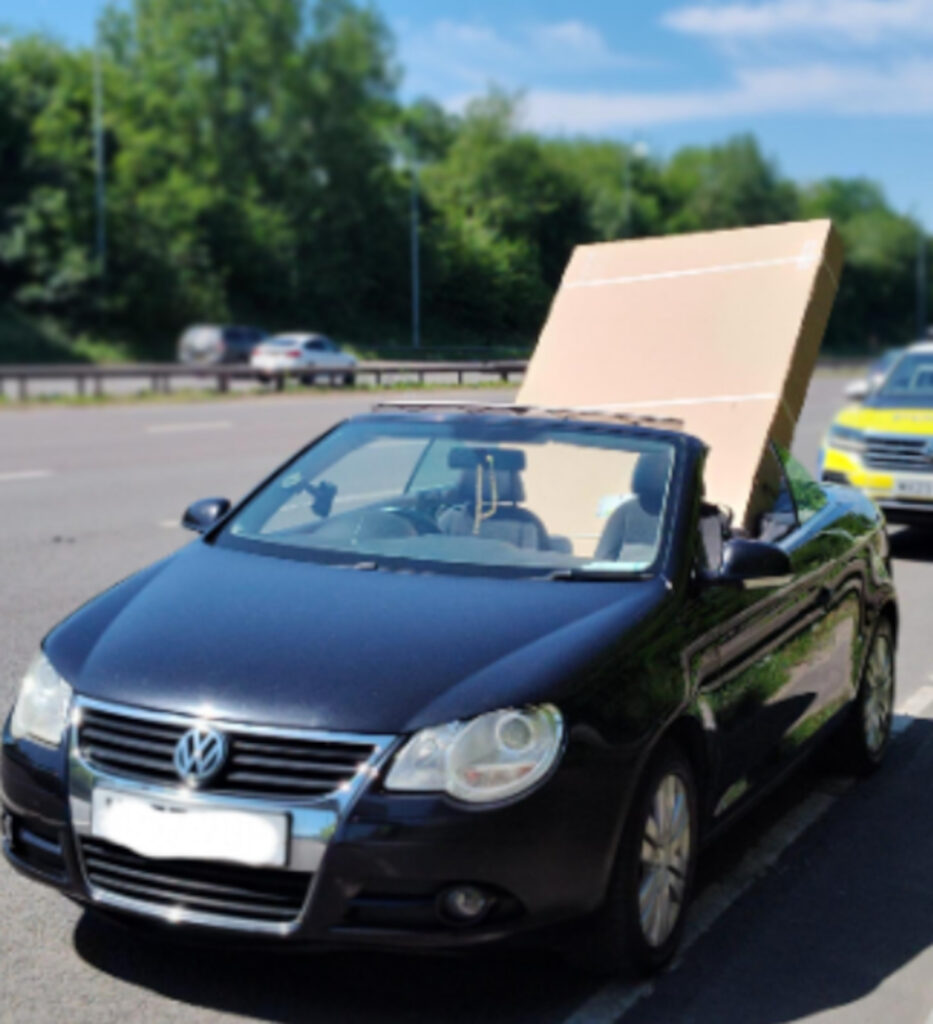The cheeky motorist told the officers he had "hold of" the massive TV.
