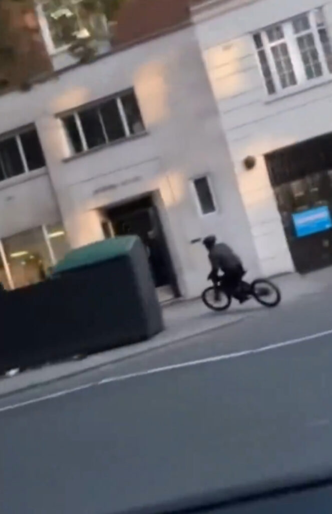 The thief escaped on his electric bike before the woman could catch him.