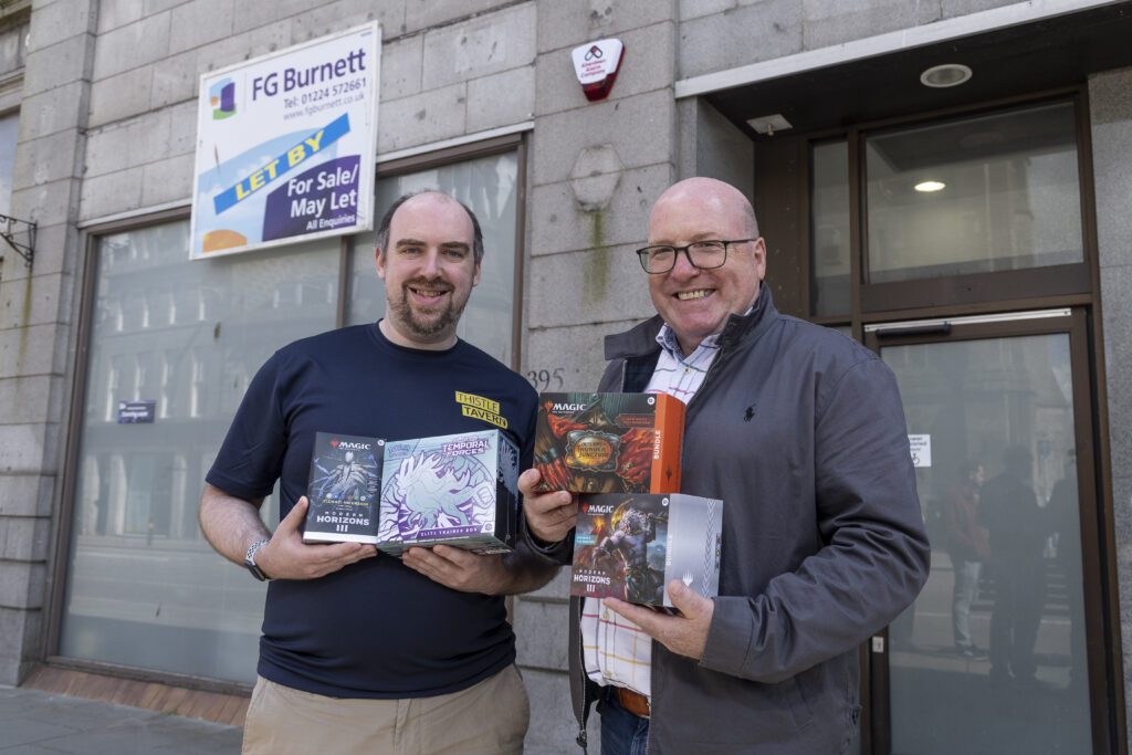 Stuart Robb from Thistle Tavern (left) with Bob Keiller of Our Union Street outside new store.