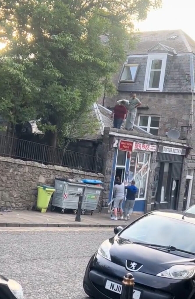 The two lads grabbed the ladder while the workmen weren't looking.