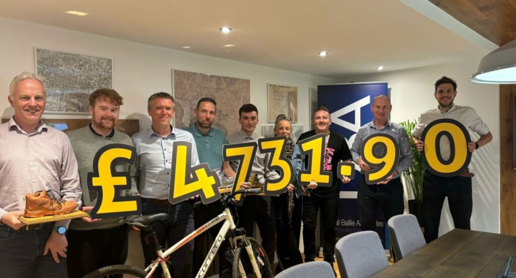 The cycling team celebrating the total raised for Beatson Cancer Charity. Image supplied with release by Blue Print Media 