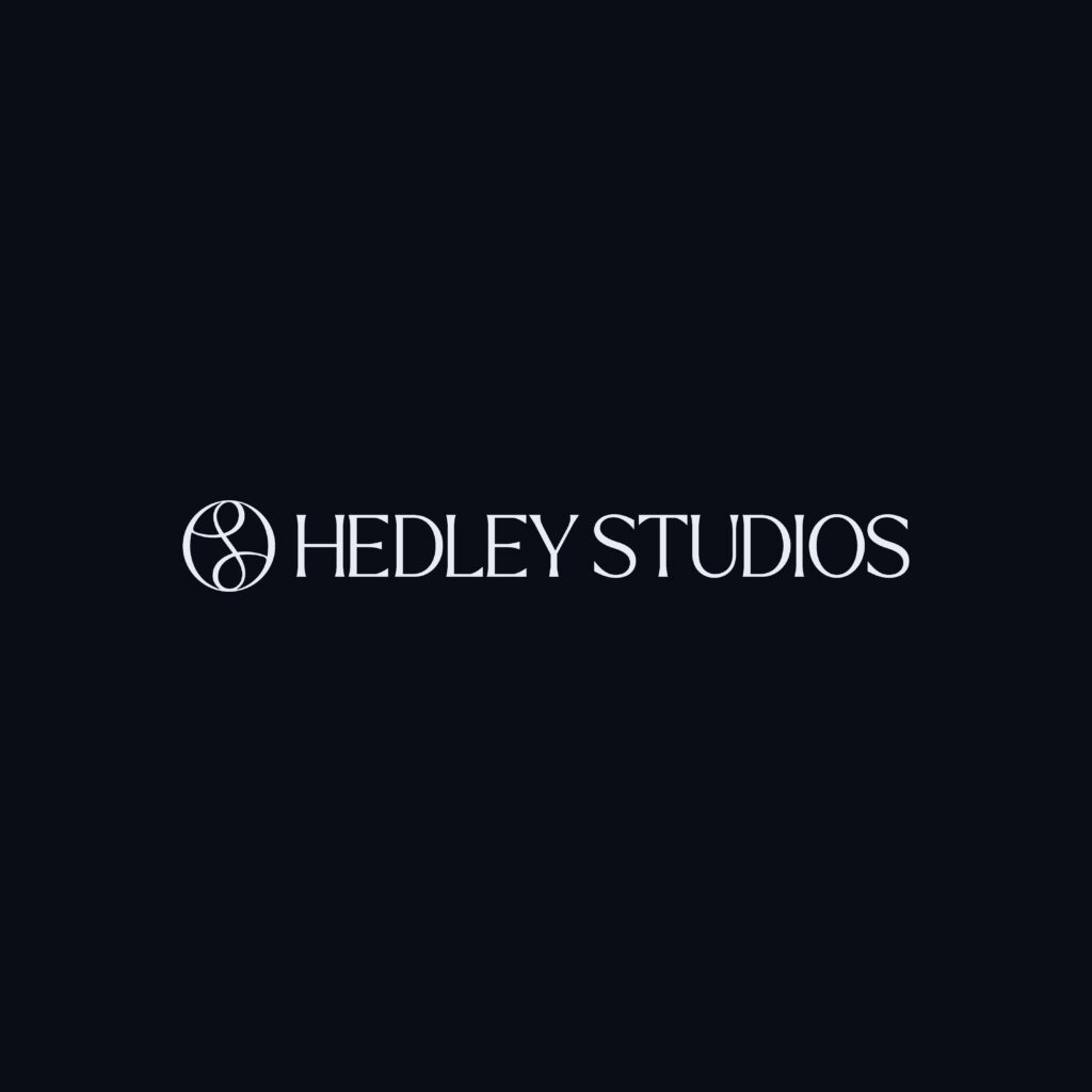 White text on a black background in a vintage-style font reading 'Headley Studios' in all-caps. A cursive logo in a circle sits to the left.