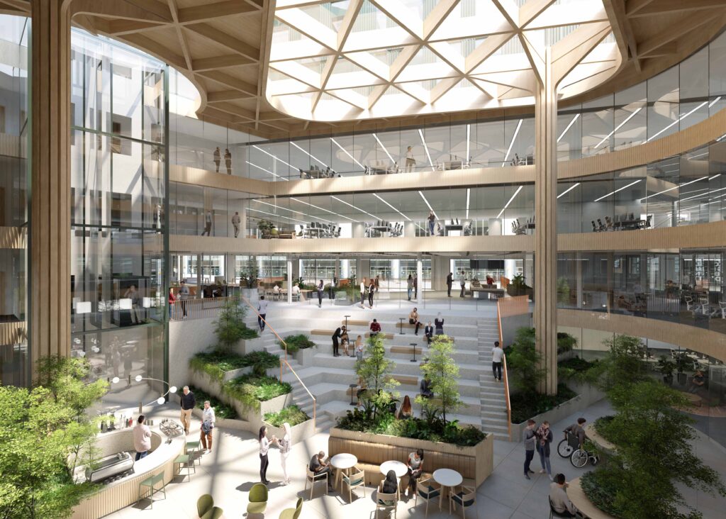 A CGI image of the atrium of a building. Much of it is glass-fronted, with two levels of office space above two levels of social and meeting space, with a cafe on the bottom floor. Shrubs and trees are present throughout.