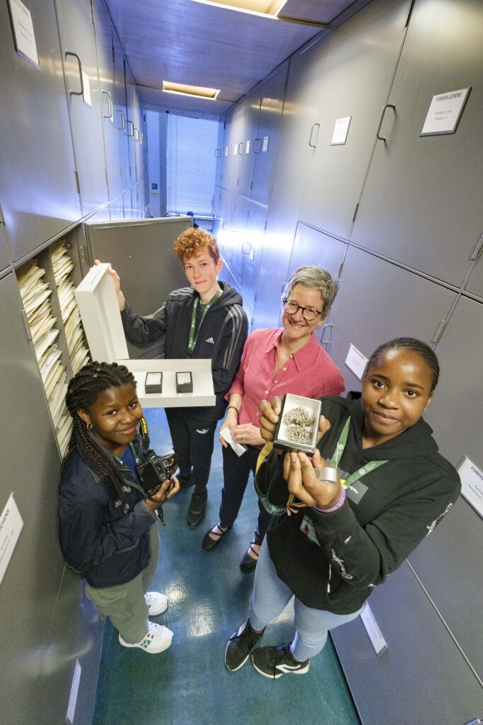 The summer club taking in the one millionth digitisation. Image supplied with release by Clark Communications. 