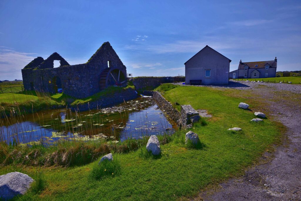 Farmhouse and ruined mill with working 18th century waterwheel. Image supplied with release by Blue Print Media.