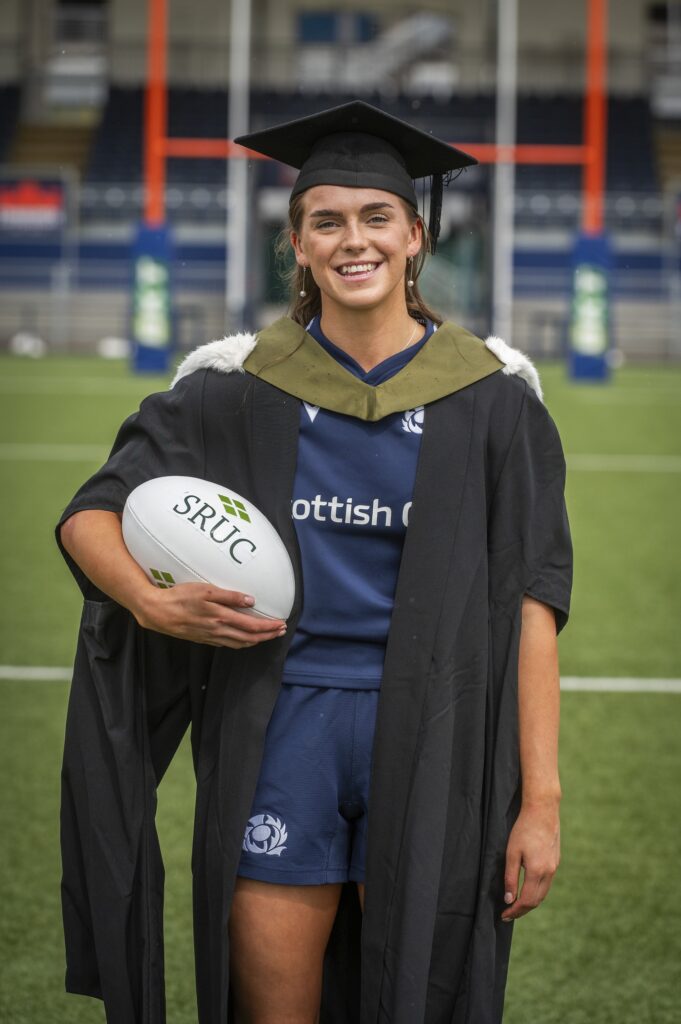 Emma Orr in her Rugby kit and graduation gown. Image supplied with release by SRUC 