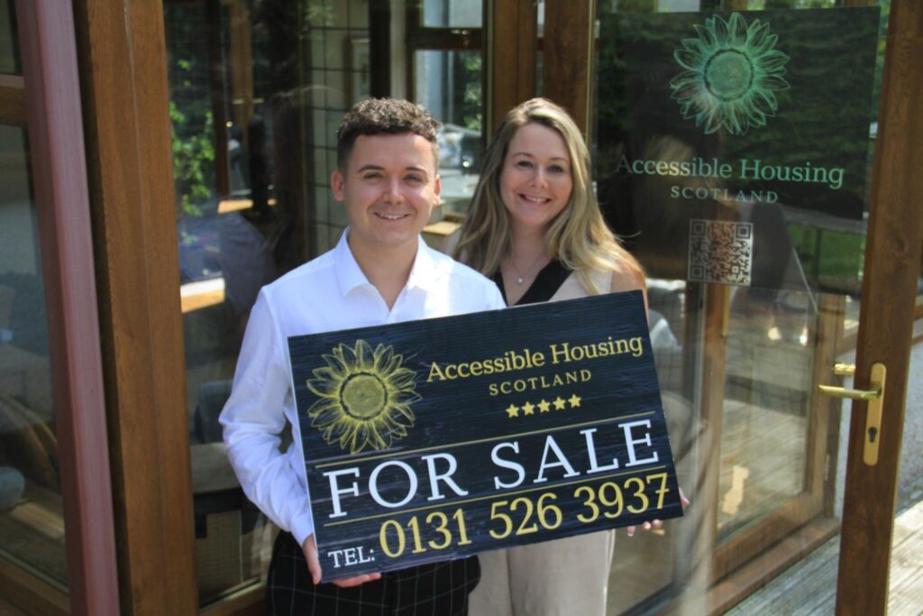 Sarah Baum and Michael Connoly, founders of AHS smile outside their office. Image supplied with release by PK Media 