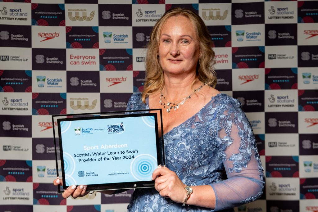 Diane Breen with Scottish Water Learn to Swim Award, showcased by Scottish PR