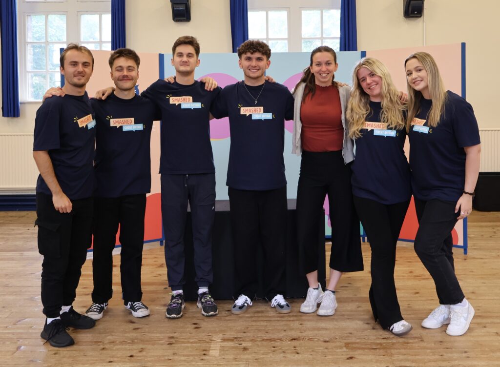 The cast of Smashed at a secondary school after a performance. Image supplied with release by Frame Creates