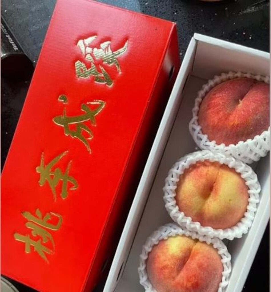 A box of three peaches sells at Harrods for £80