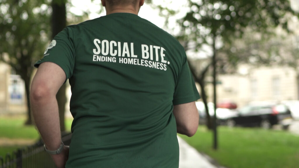 100 Mile Challenge participant wearing a 
Social Bite tshirt. 