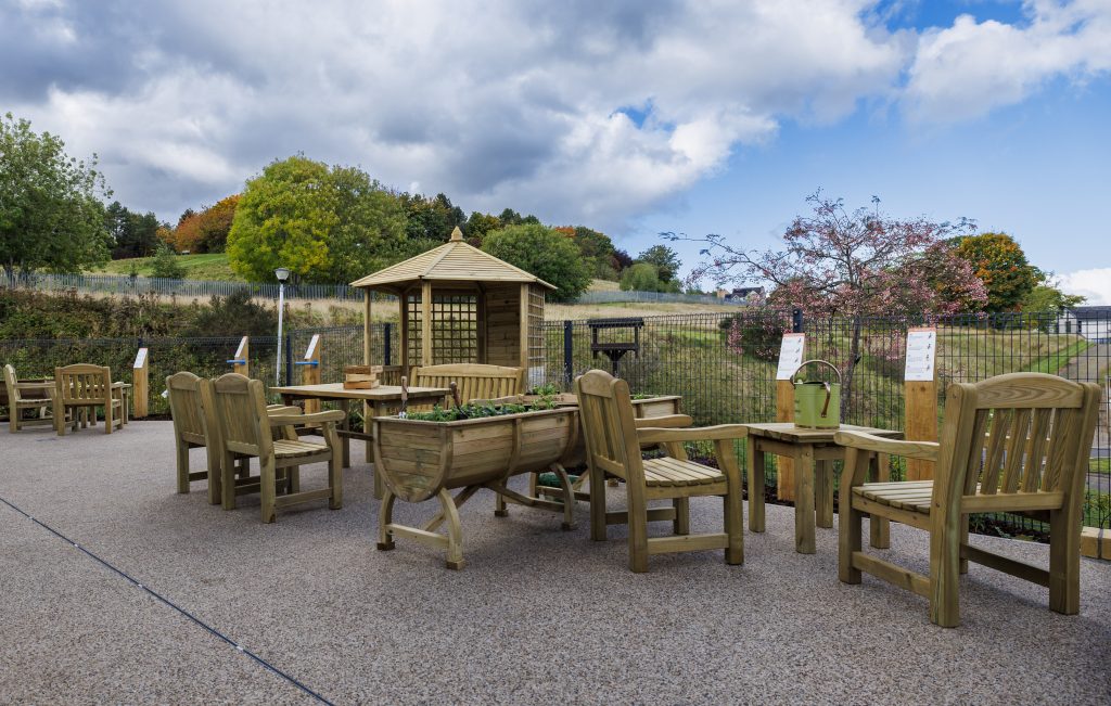 Tables and chairs in sensory garden, Tay Ward | PR