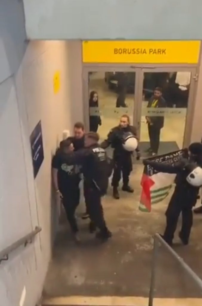 THIS is the shocking moment a Celtic fan was assaulted by German police for carrying a Palestinian flag.