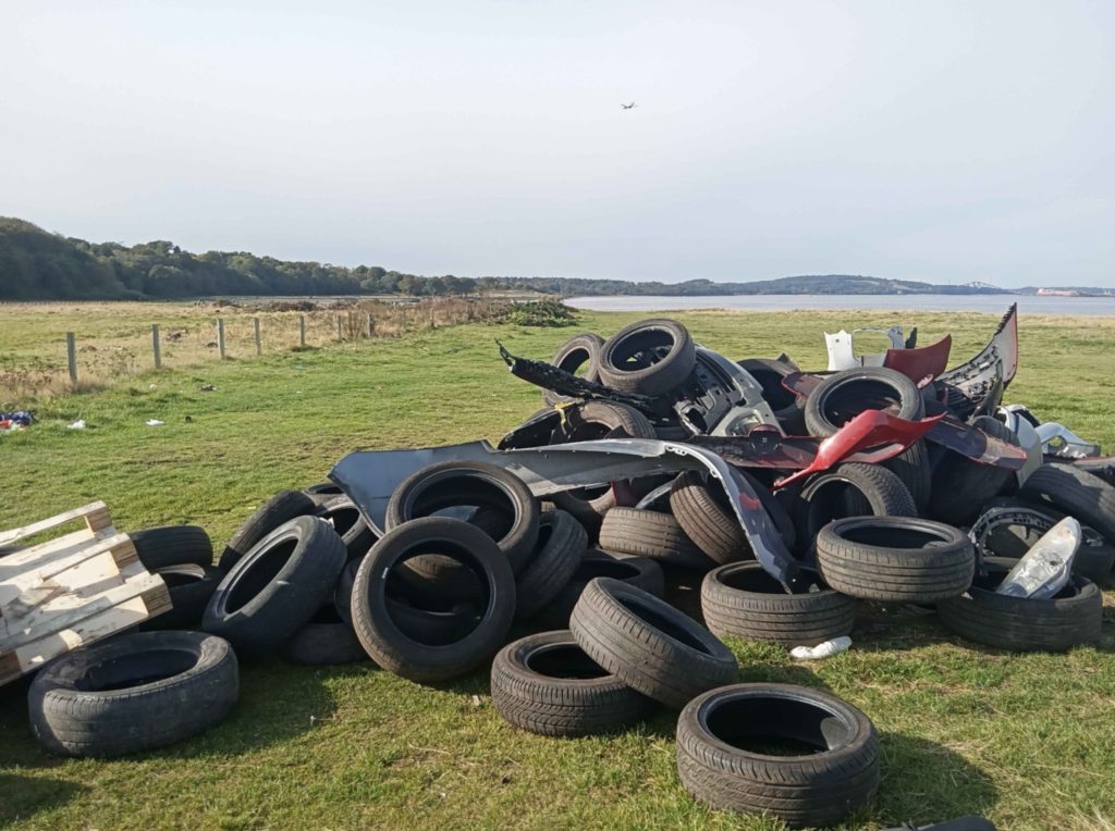 EDINBURGH locals have been left furious after travellers reportedly left a pile of discarded rubbish dumped at a coastal Edinburgh beauty spot.