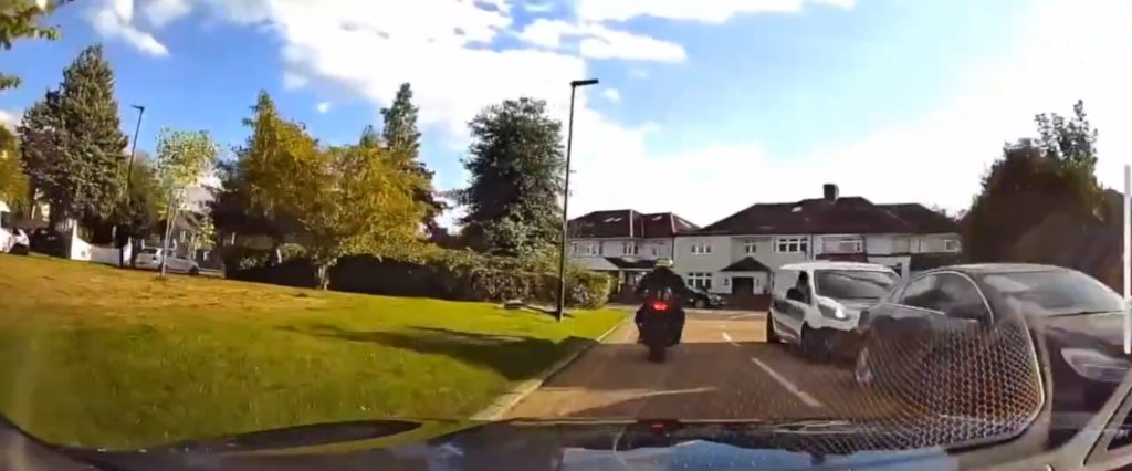 THIS is the horrifying moment a passenger who chased a biker that allegedly crashed into the car he was in is sent flying after being run down by the culprit.