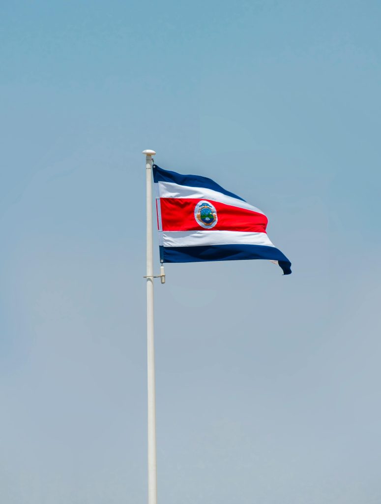 Photo by aboodi vesakaran: https://www.pexels.com/photo/flag-of-costa-rica-swaying-by-the-wind-13966934/