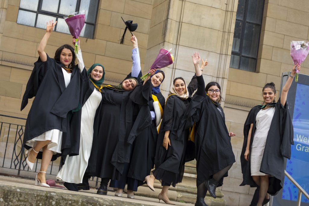 The graduates celebrating their success