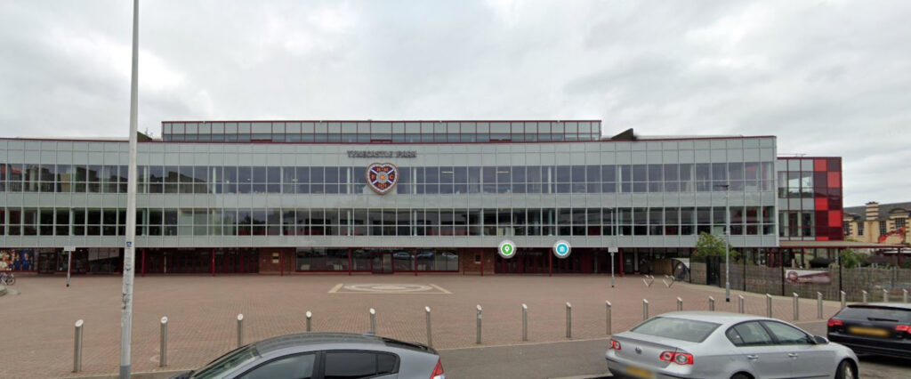 An image of a glass-fronted football stadium