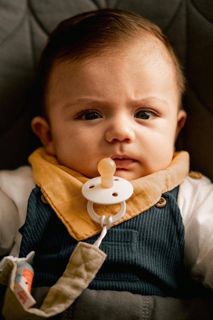 Photo by Ça?lar Gelmi?: https://www.pexels.com/photo/adorable-baby-with-pacifier-in-turkiye-28757473/