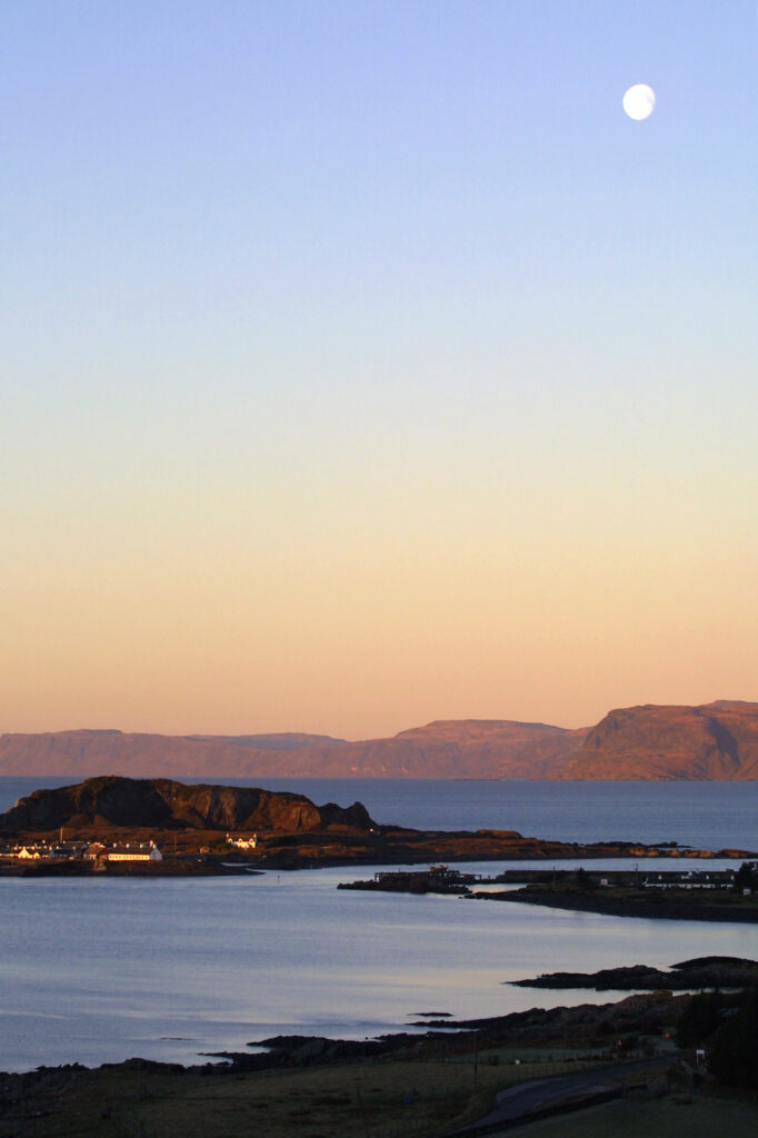 The moon rising over Mull on the west coast of Scotland.