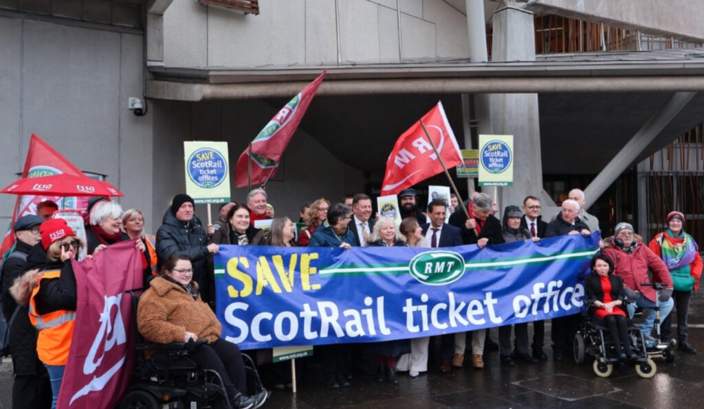 The protest outside of the Scottish Parliament.