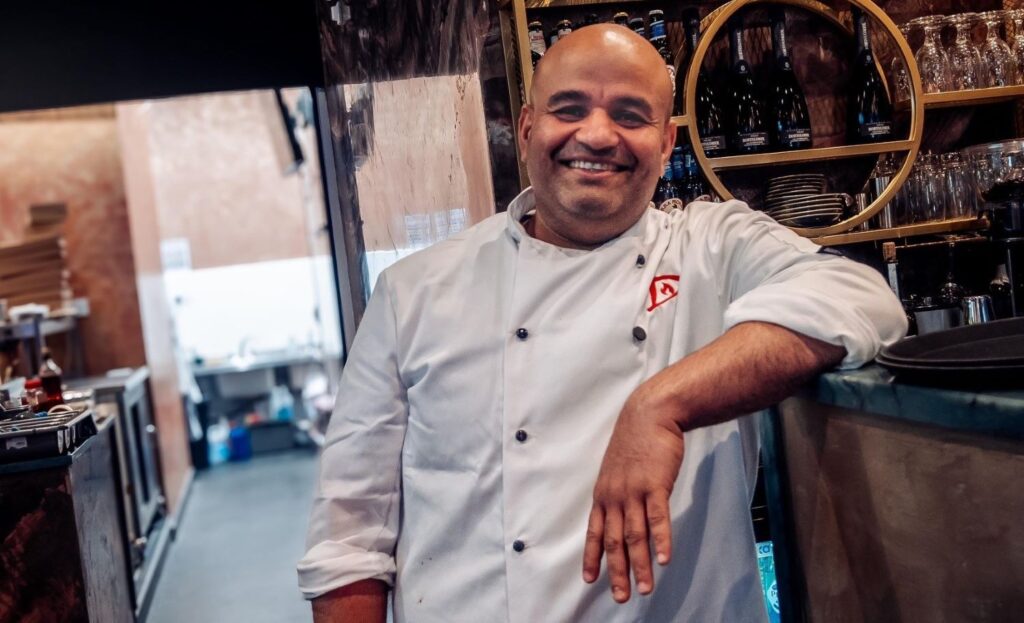 A photo of Vinu Murugan, the head chef and owner of Fired Dough.