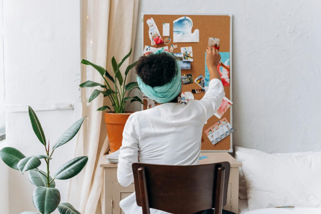 Photo by Mikhail Nilov: https://www.pexels.com/photo/woman-in-white-long-sleeve-shirt-sitting-on-chair-6932125/