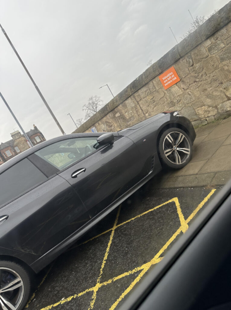 The BMW managed to commit two parking offences. (C) Reddit.