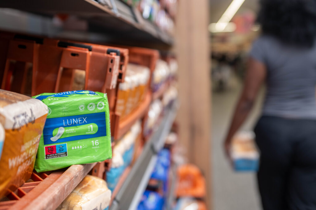 Image shows Aldi brand sanitary products in store.