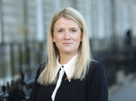 A headshot of Helen Kidd.