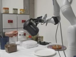 The robot in action. (C) Edinburgh University.